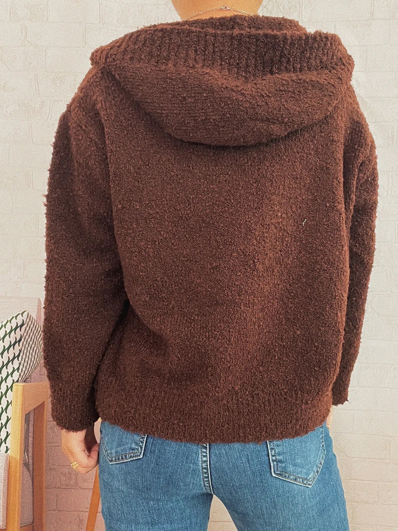 Brown hooded cardigan back view with full hood and long sleeves, textured knit