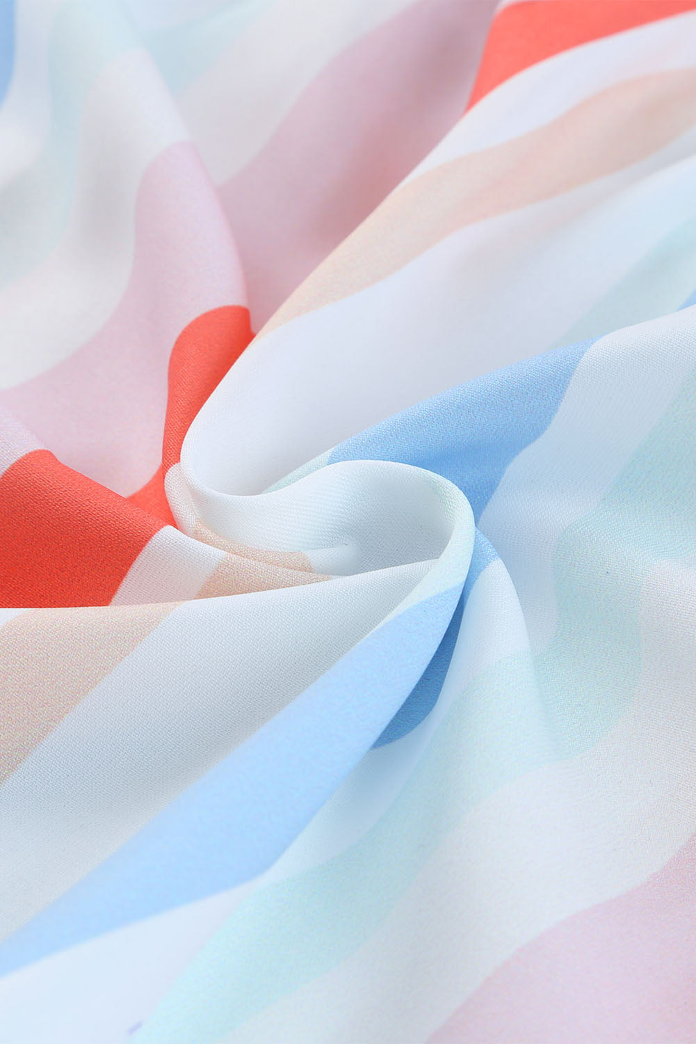 Multicolor striped fabric close-up with soft drape