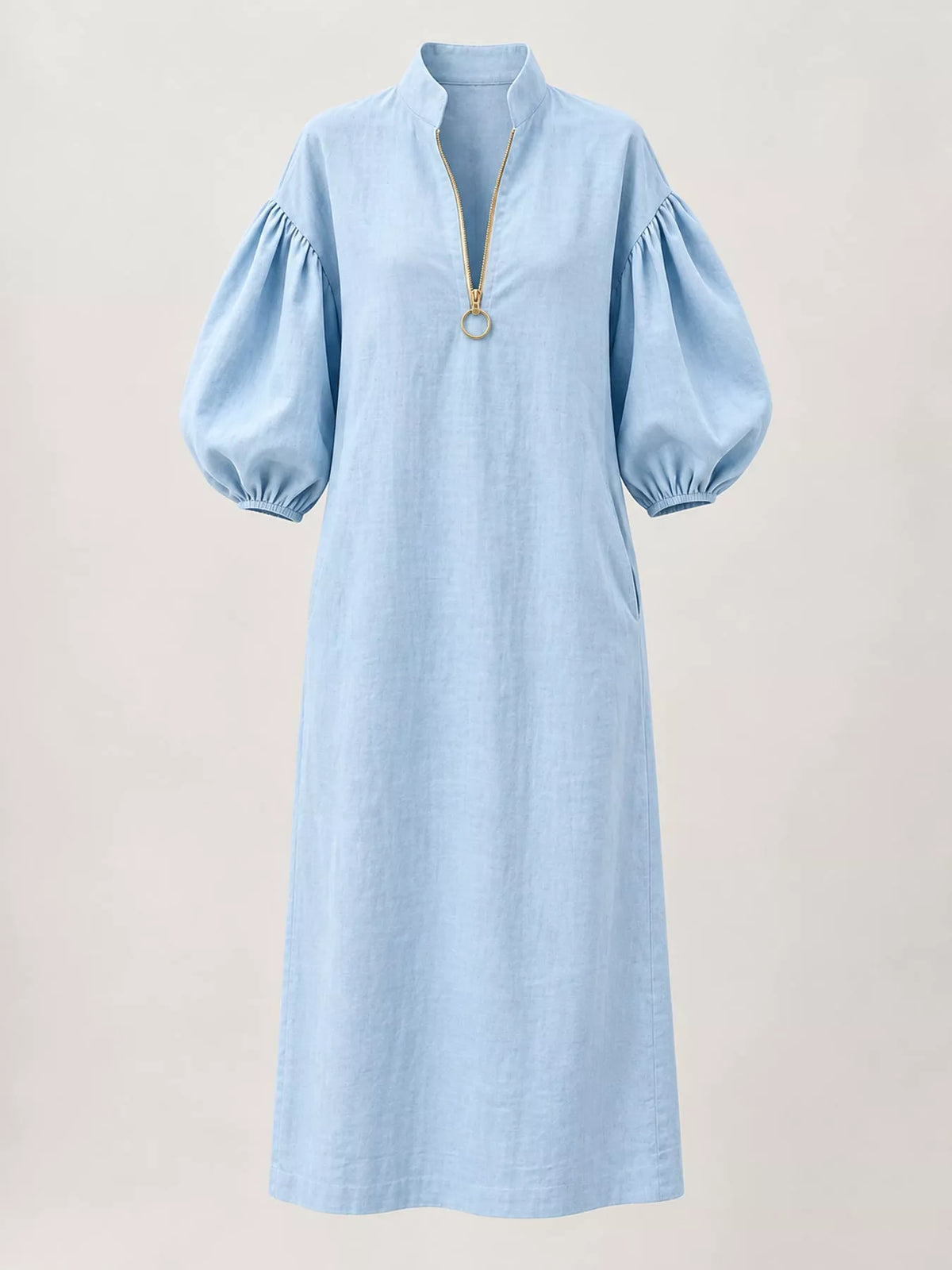 Light blue midi dress with half-zip neckline and gathered balloon sleeves