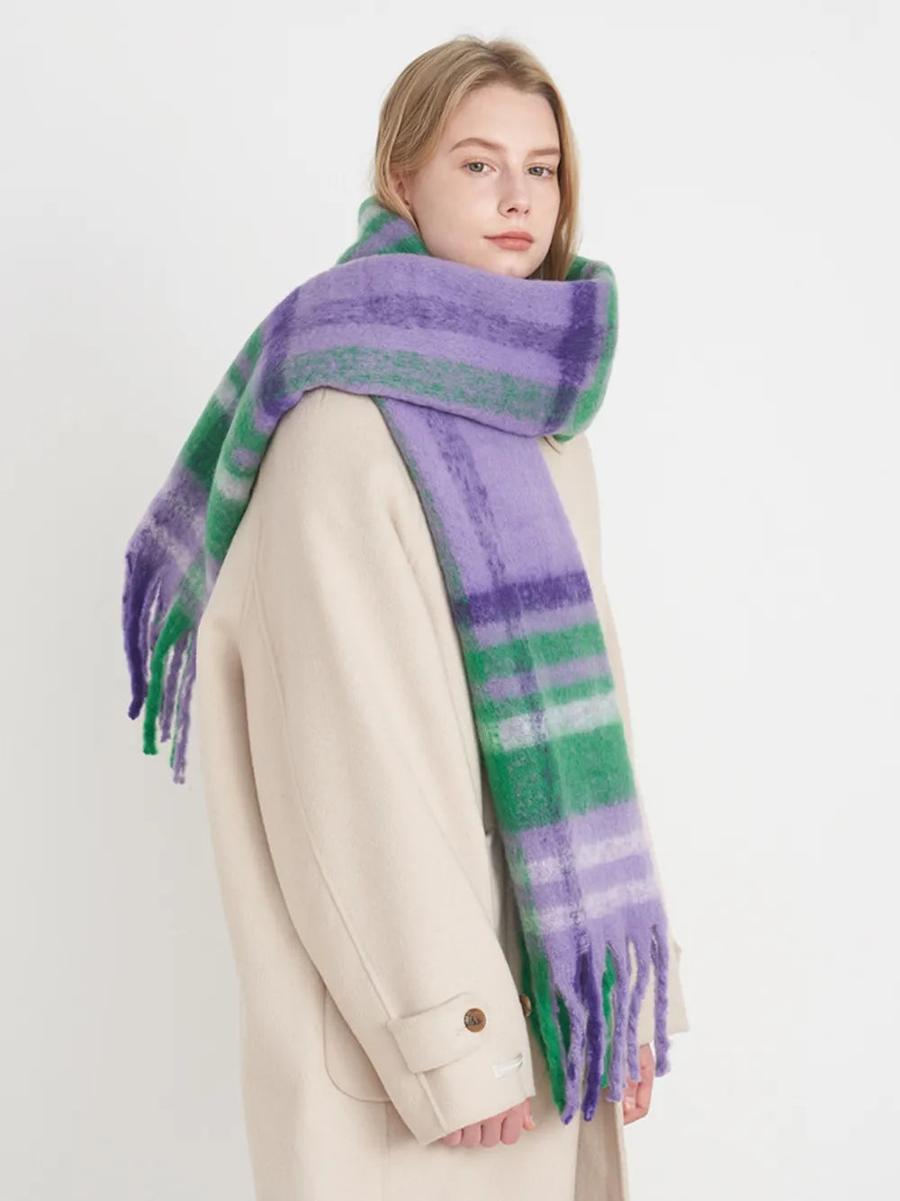 Plaid polyester scarf with purple and green stripes and long fringe.