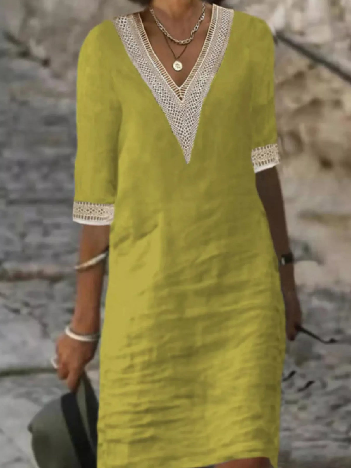 Yellow-green V-neck lace-trim half-sleeve dress with lace cuffs and straight shift cut