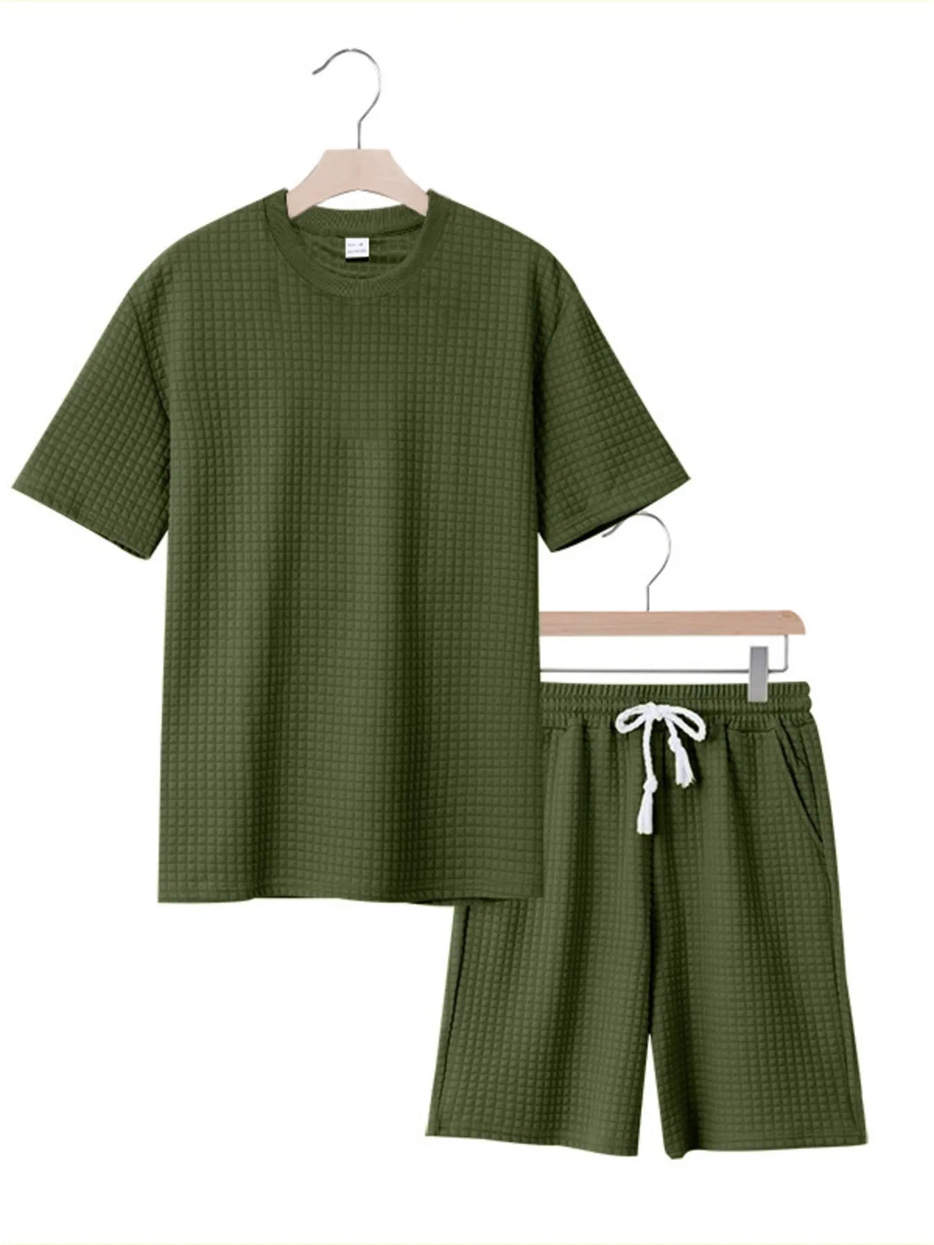 Men's textured short-sleeve top and drawstring shorts set in dark green on hangers