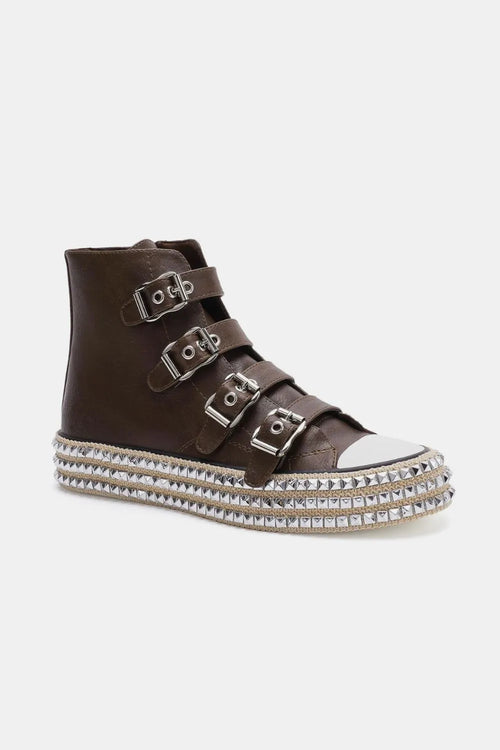 Dark brown high-top platform sneakers with three metal buckle straps