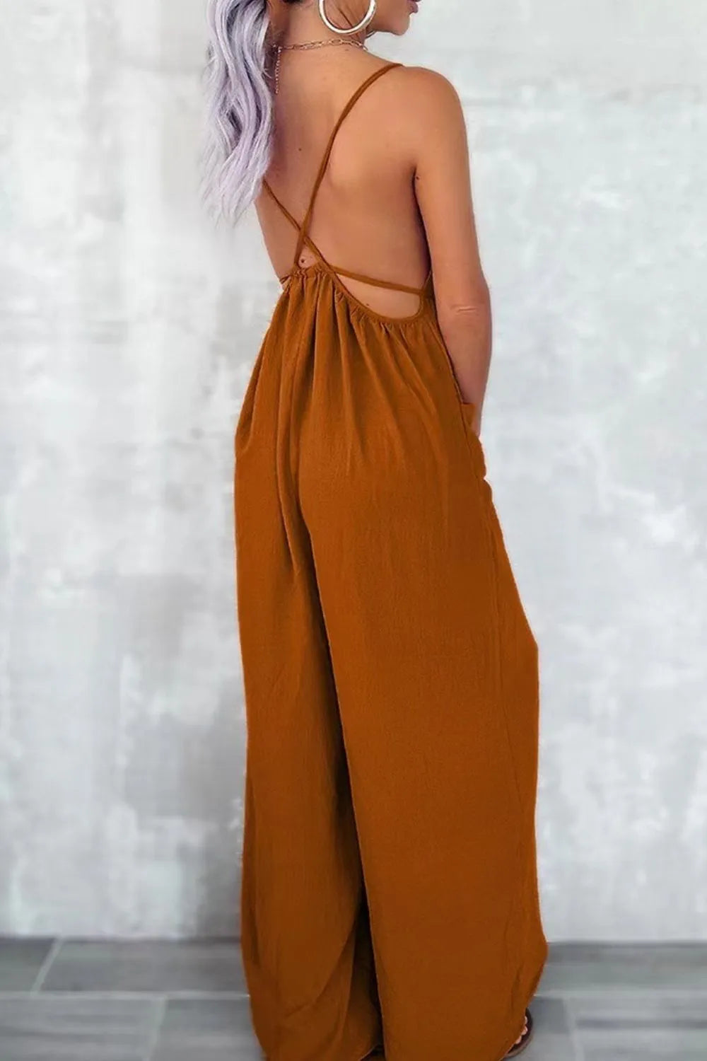 Terracotta spaghetti-strap wide-leg jumpsuit with open back and cross straps