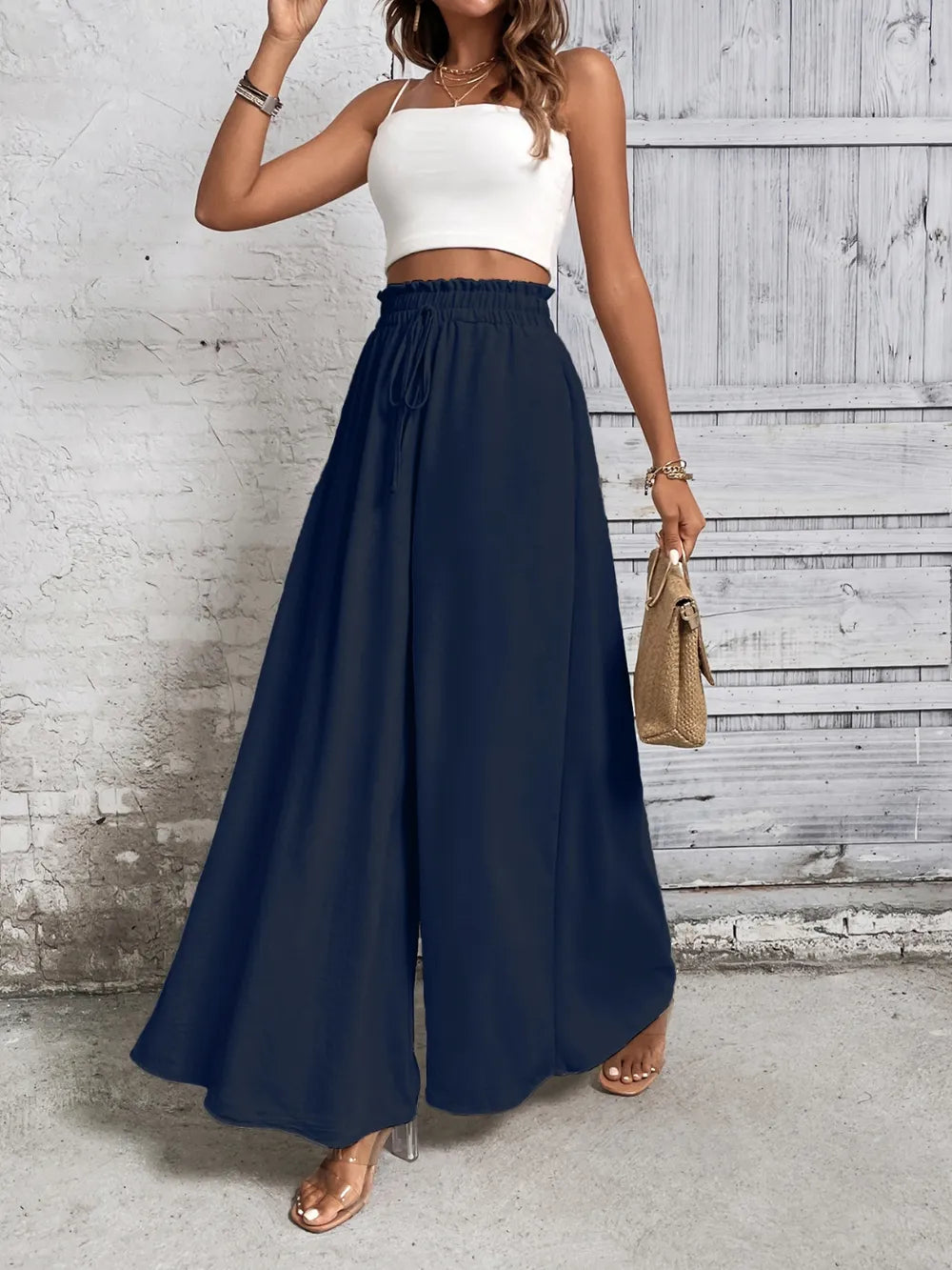 Navy high waist wide-leg pants with elastic waistband and drawstring ties