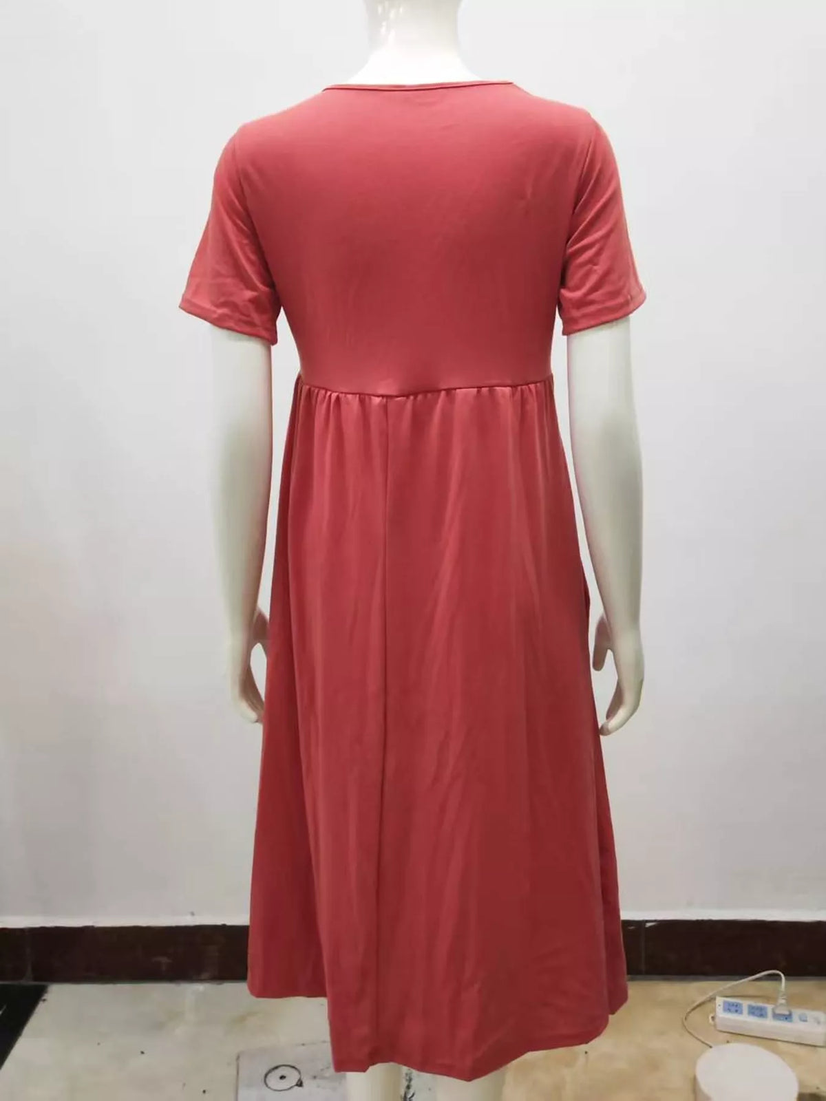 Watermelon red midi dress on mannequin, back view with short sleeves and waist gathers