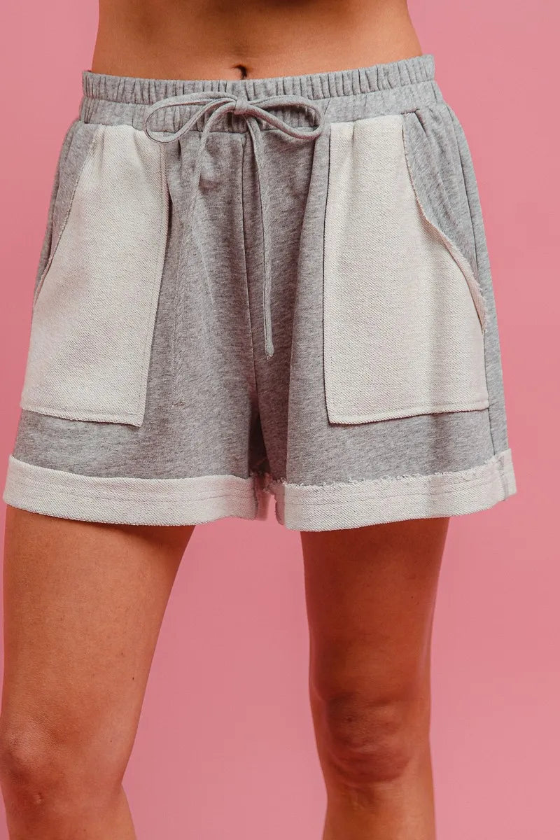 Heather grey French terry knit shorts with drawstring and side pockets