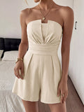 Cedar & Moore strapless ivory romper with pleated bodice and wide waistband, Trendsi.