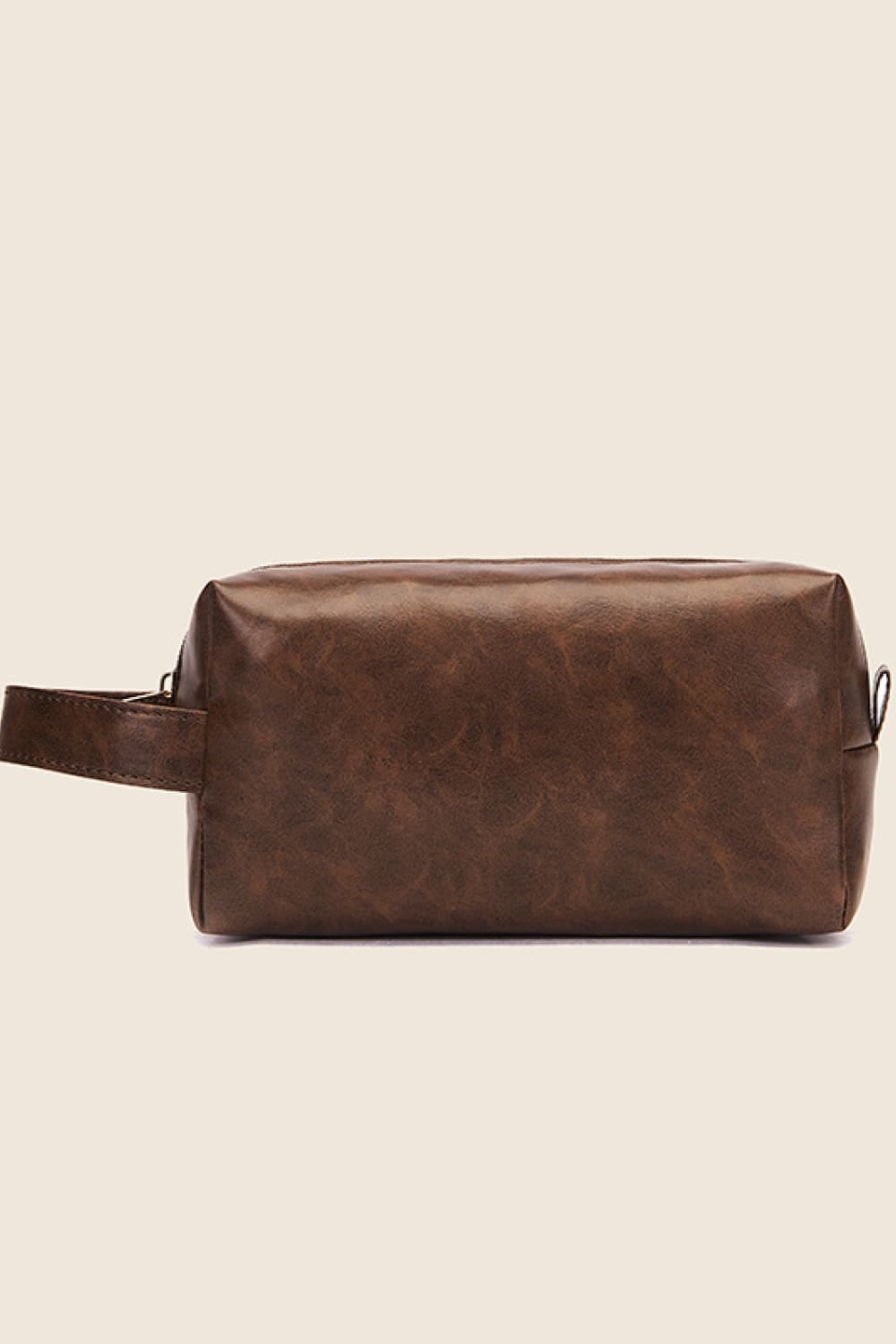Brown vegan leather makeup bag with top zipper and side carry handle