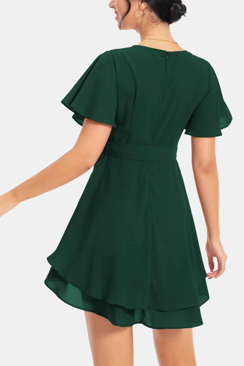 Dark green back-view surplice flutter sleeve mini dress with tiered hem