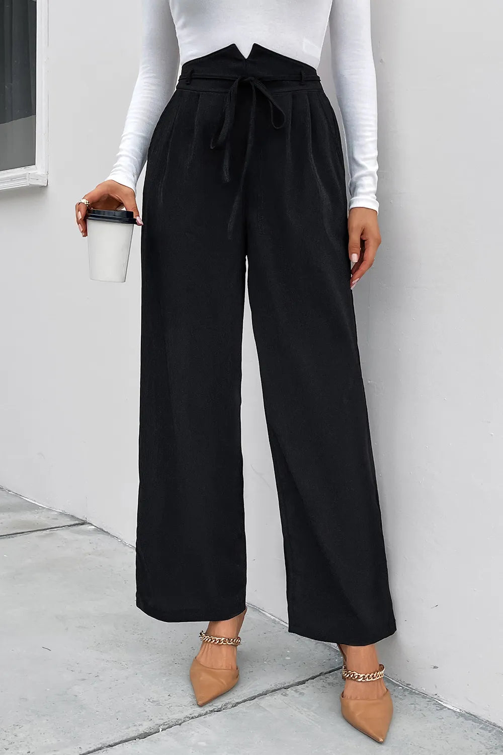 Black high-waist tie-front wide-leg pants with ruched waistband