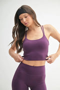 Crisscross sports bra in merlot with wide straps and smooth racerback front