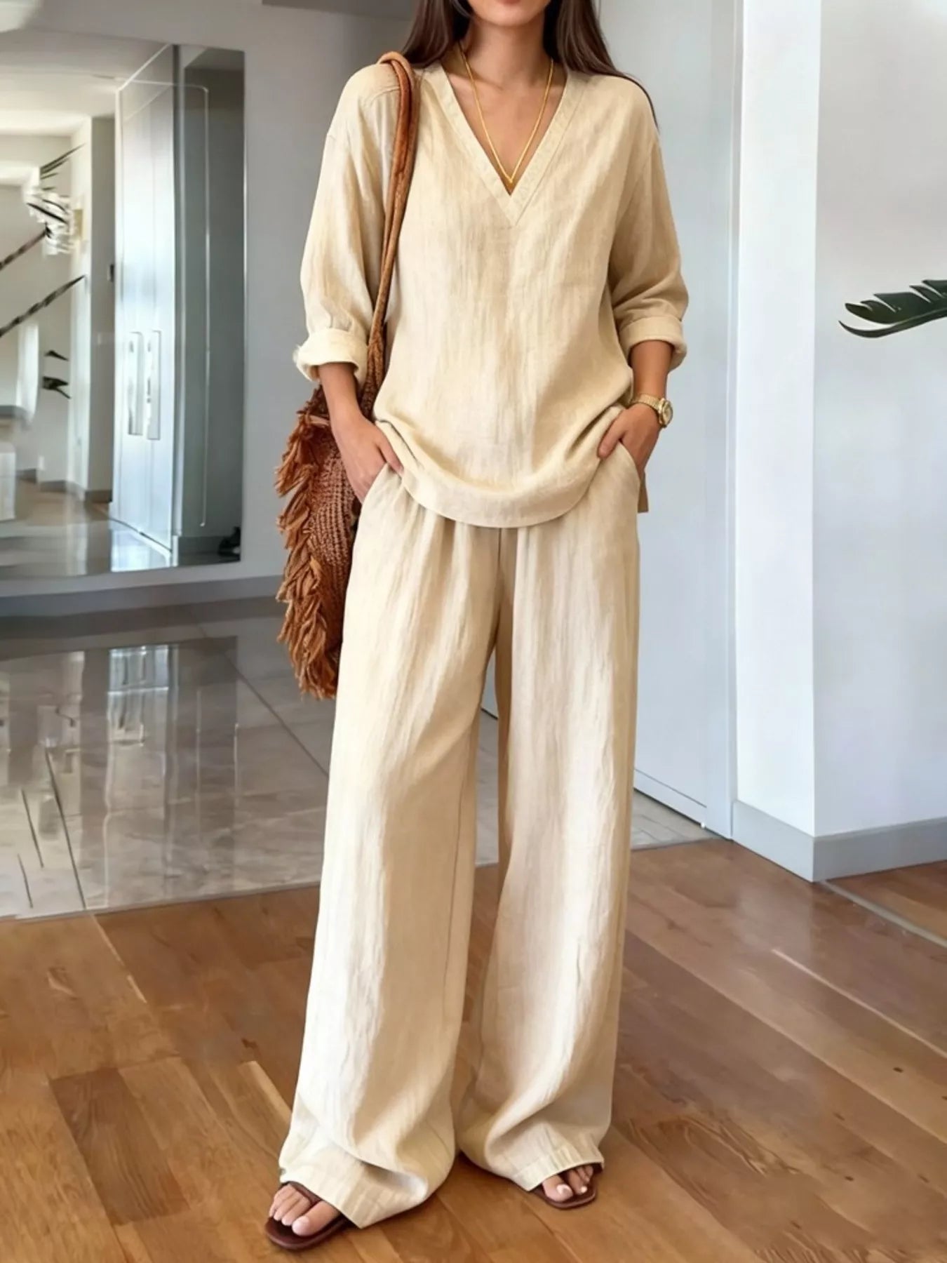 V-neck top and wide-leg pants set in cream, loose top with V-neck