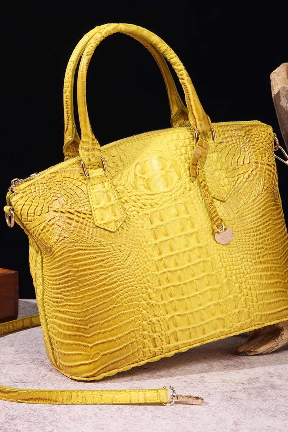 Vegan leather handbag in yellow with top handles and embossed crocodile texture