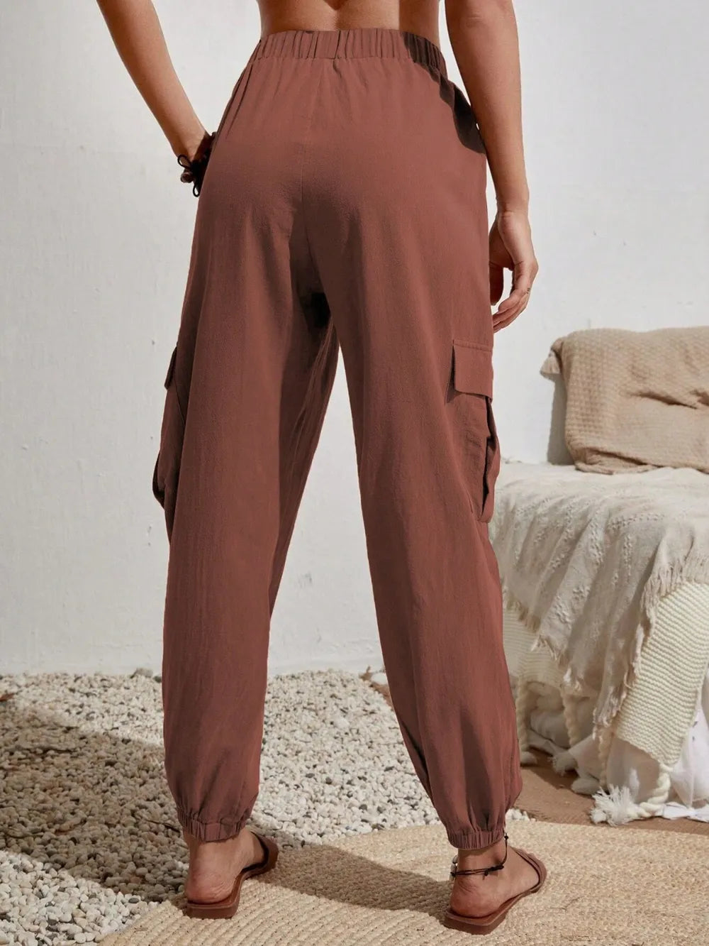 Dusty rose drawstring cargo joggers with cargo pockets and elastic ankle cuffs