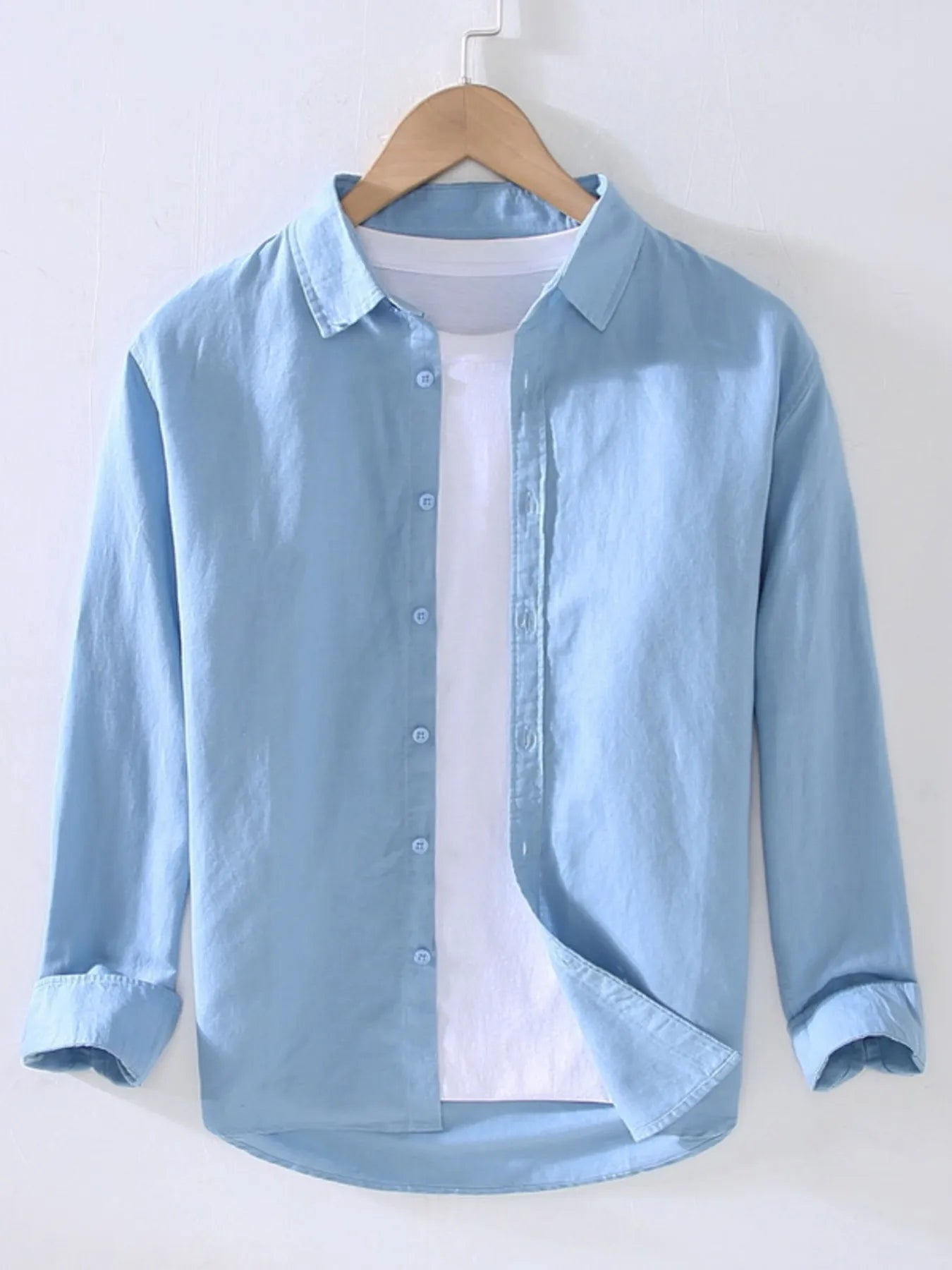Blue short-sleeve button-up shirt with point collar and front button placket