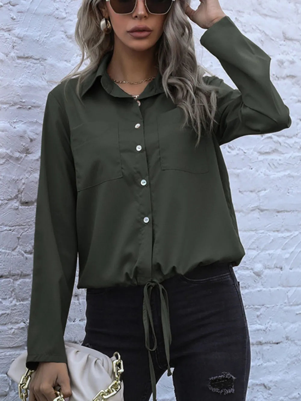 Olive long-sleeve button down shirt with tied hem and chest pocket, button front