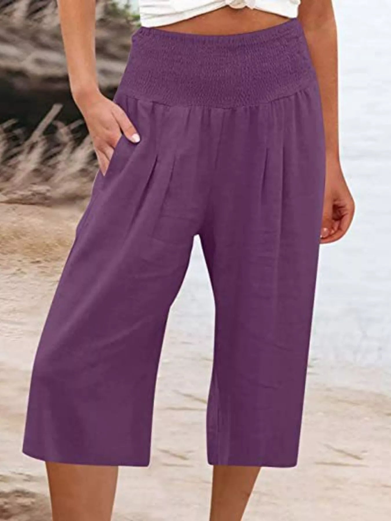 Smocked wide-leg capri pants in purple with side pockets
