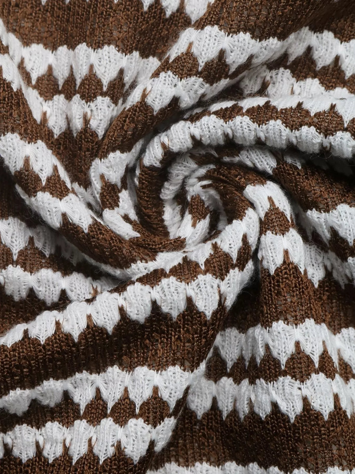 Close-up of brown and white striped ribbed knit texture and stitching