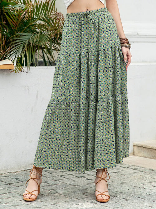 Matcha green tiered maxi skirt with gathered panels and small allover print