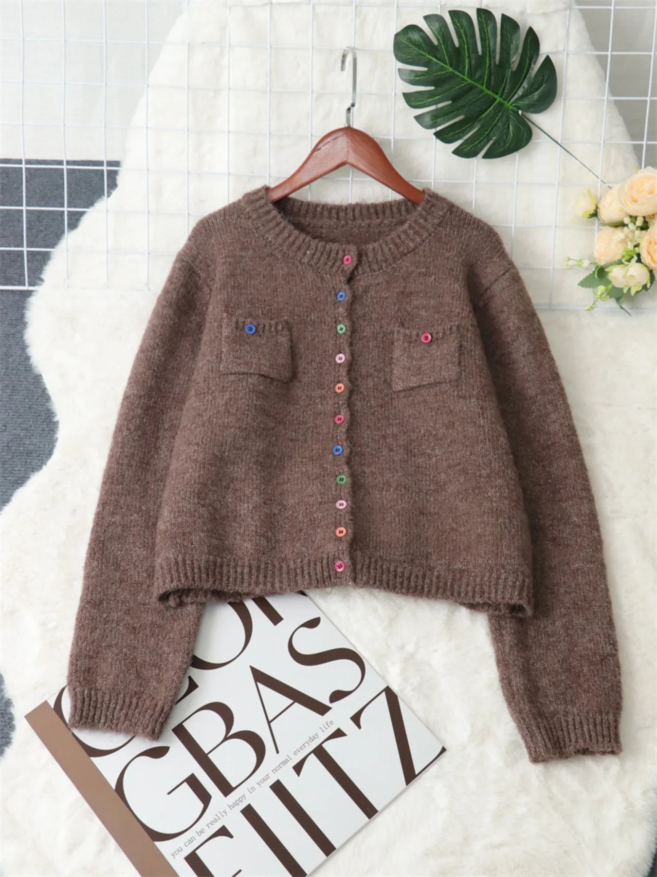 Brown button-up ribbed-hem cardigan with chest pockets and multicolor button front
