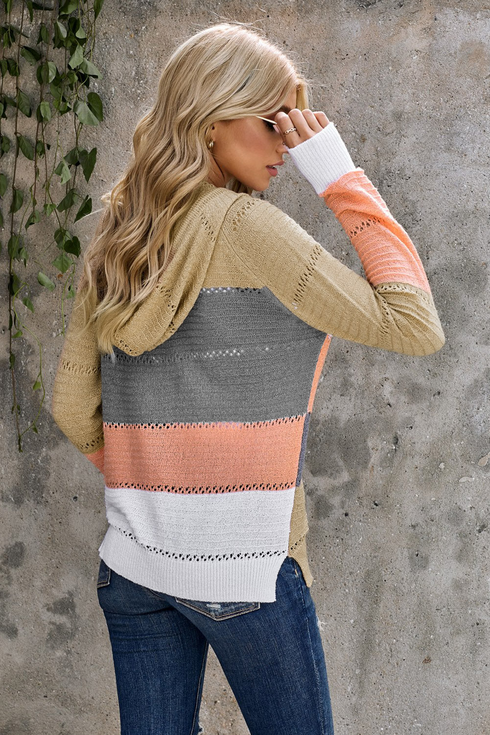 Beige zip-up hooded cardigan back view with openwork yoke, orange and white stripe panels
