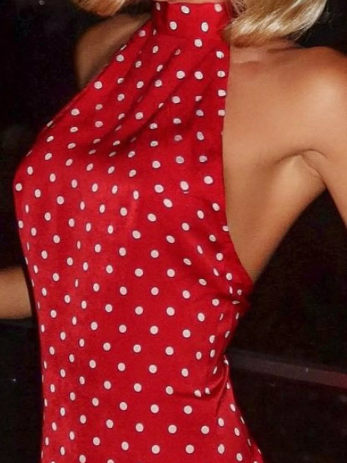 Red polka-dot halter mini dress with high neck and backless open-back design