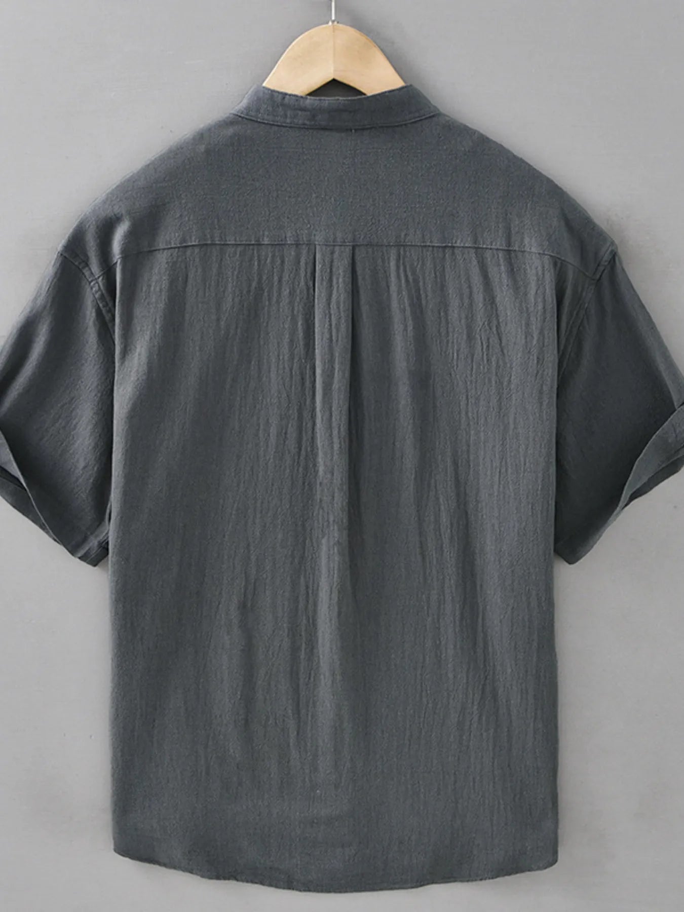 Dark gray plus size button-up short sleeve shirt, back view with yoke seam