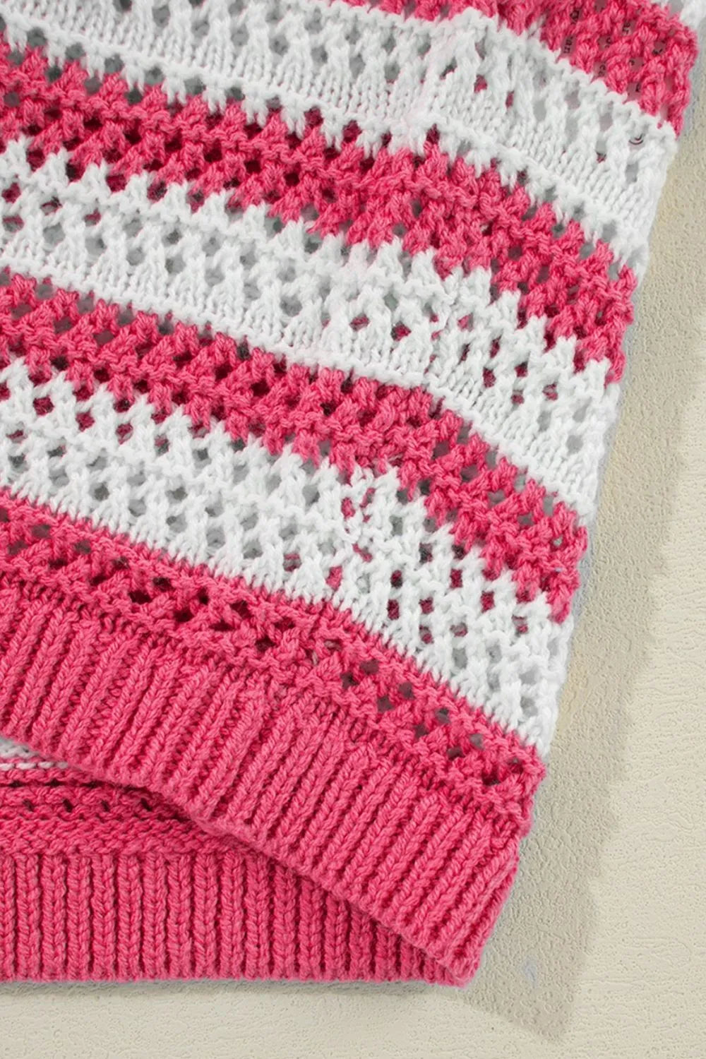 Sleeveless striped knit sweater dress, pink and white, ribbed hem and vertical texture