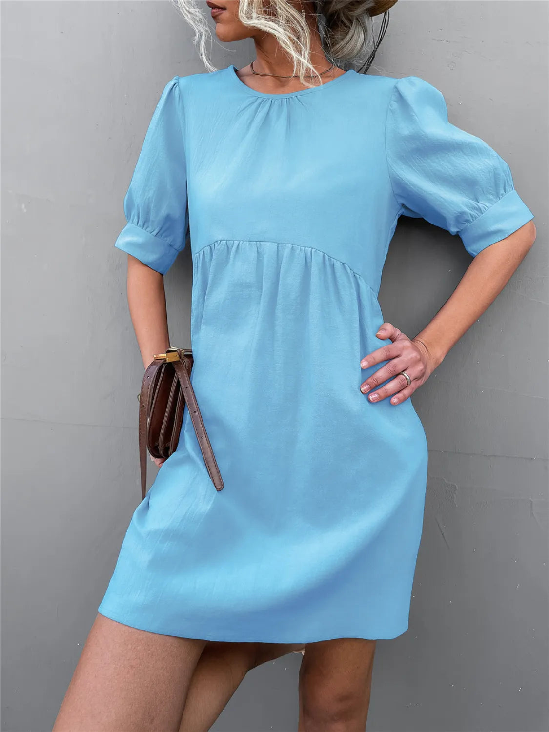 Round neck puff-sleeve mini dress in light blue with a gathered waist, basic style