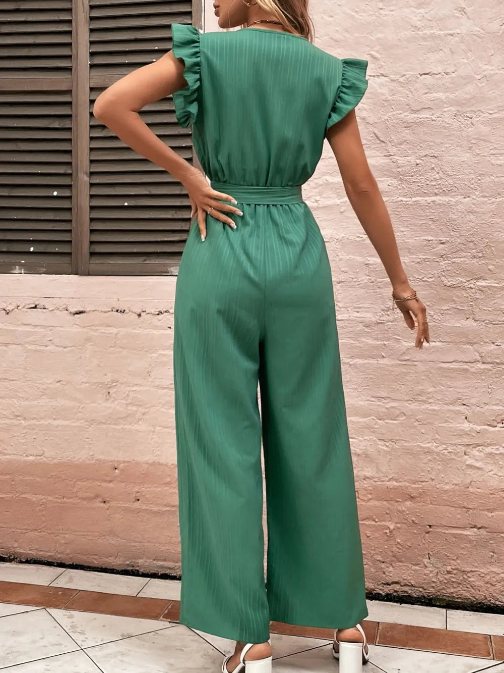 Ruffled surplice jumpsuit, dark green with ruffled cap sleeves and tied waist belt