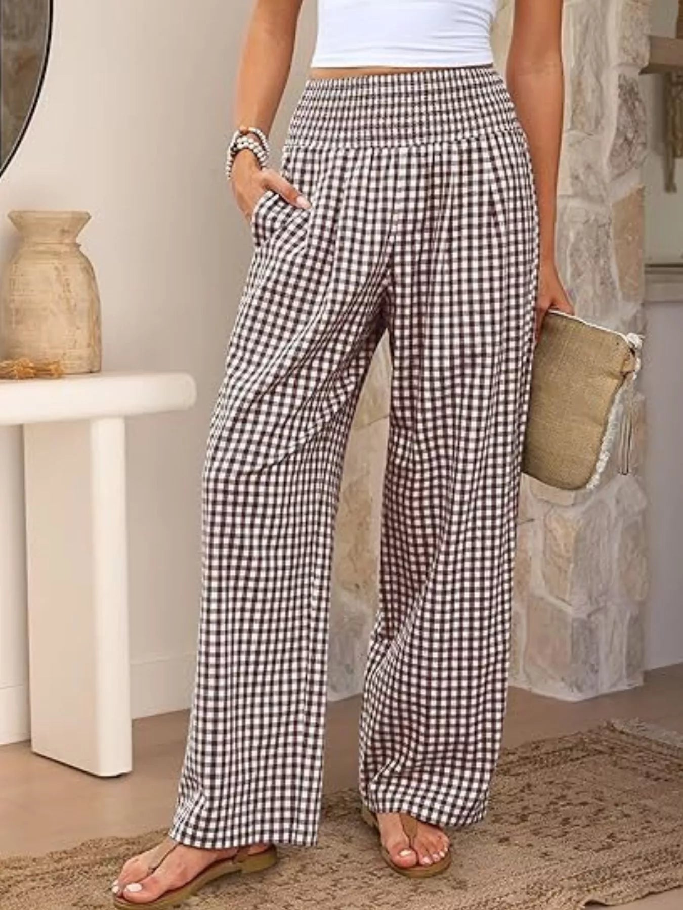 Black gingham wide-leg pants with smocked waist and side pockets