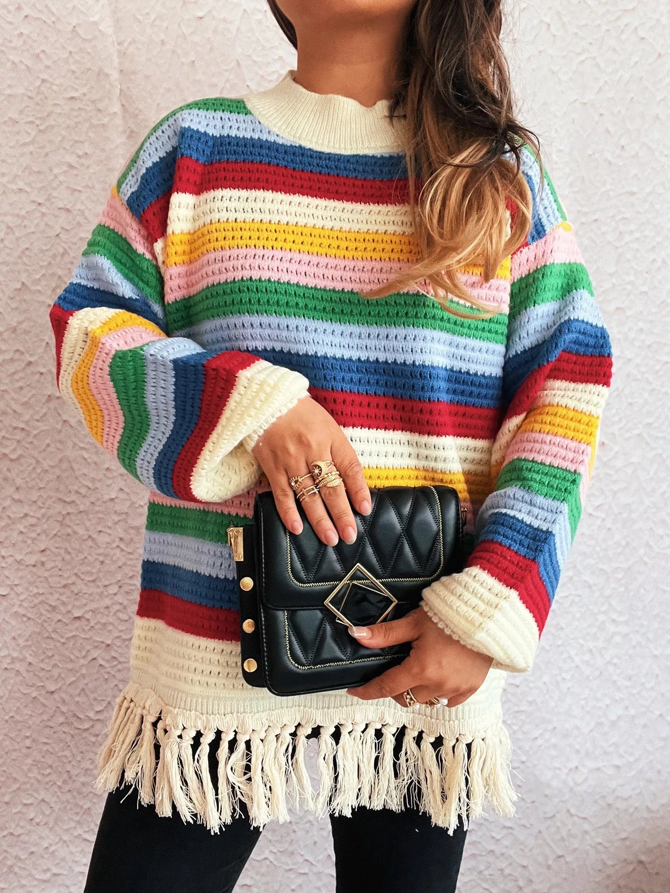 Rainbow striped long sleeve sweater with cream collar and tassel fringe detail