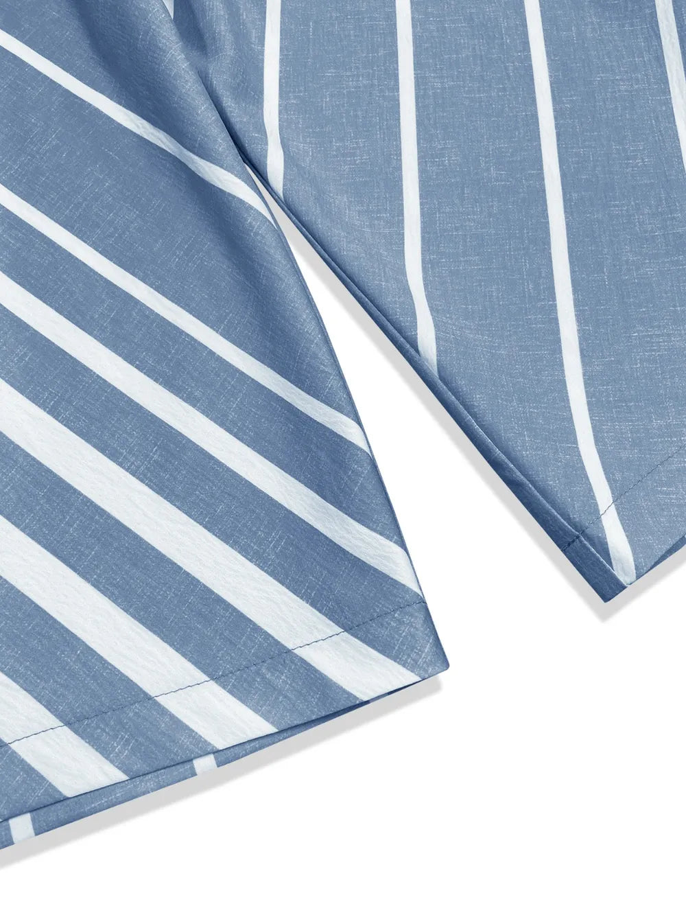 Light blue striped fabric panel from wide-leg pants, diagonal seam detail
