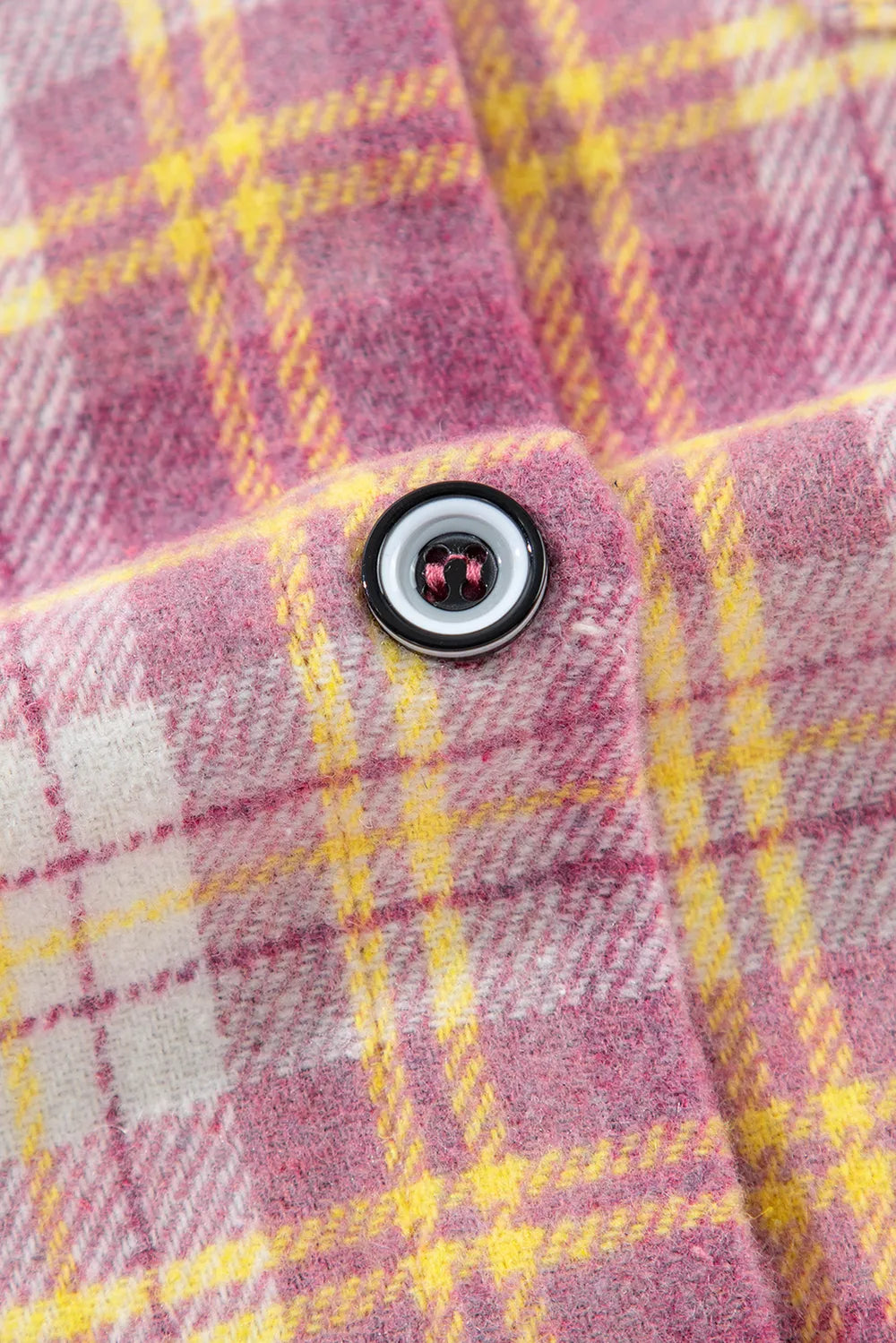 Pink plaid shacket button closure detail