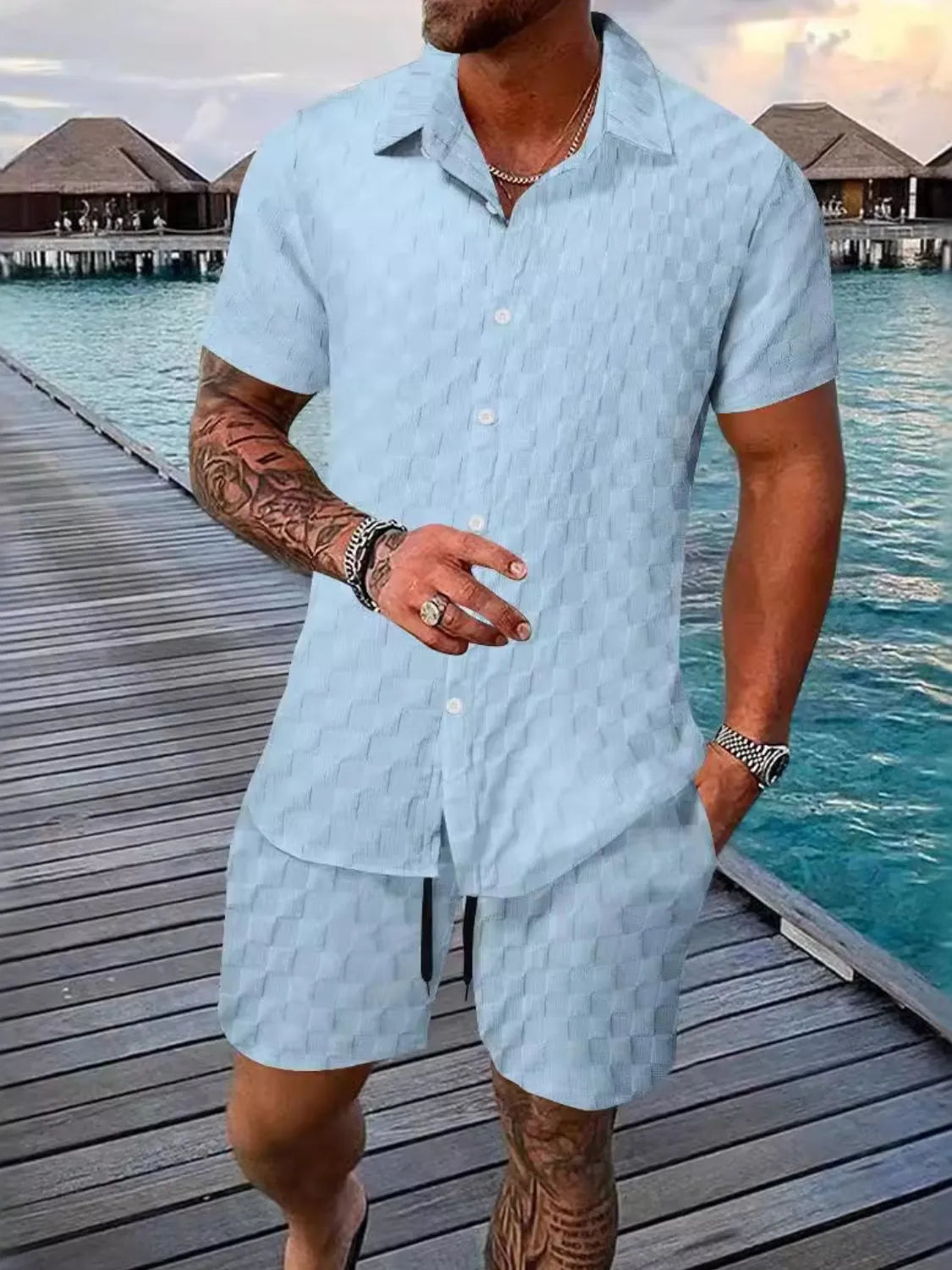 Light blue textured collared short-sleeve shirt and matching shorts set, button front