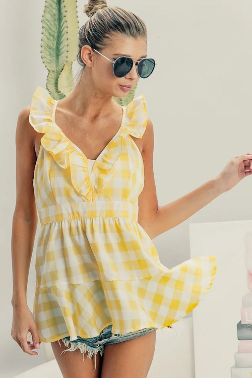 Lemon-and-ivory gingham sleeveless peplum top with ruffled V neckline