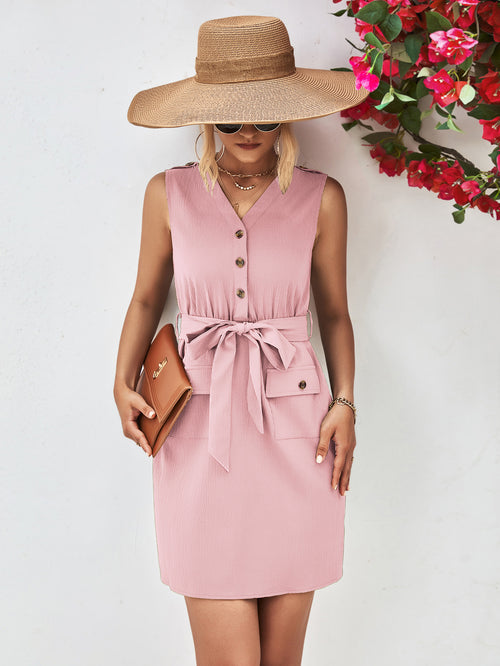 Blush pink sleeveless V-neck button dress with tied waist belt and flap pockets