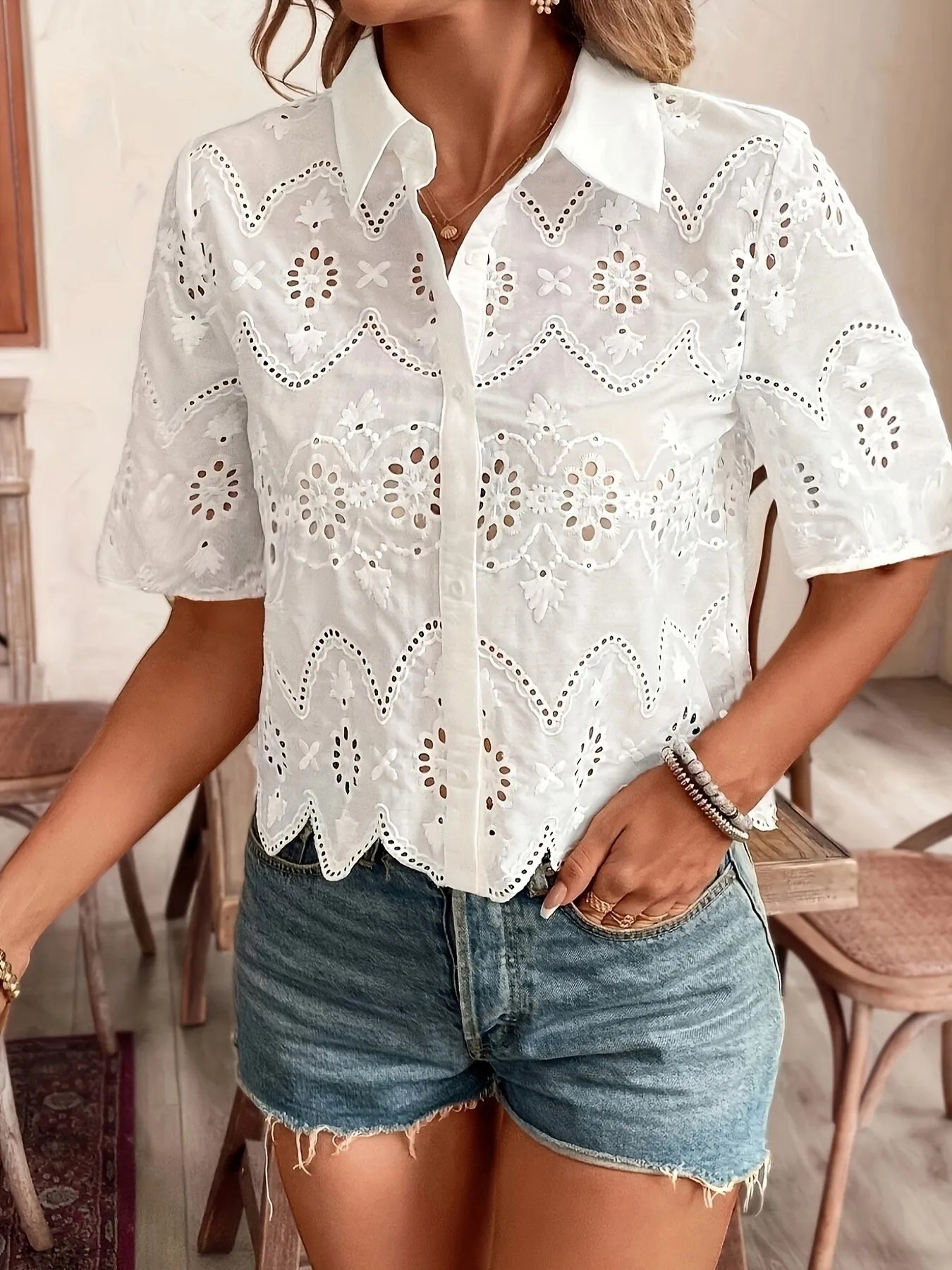 White eyelet lace short-sleeve button-up shirt with scalloped collar and button placket