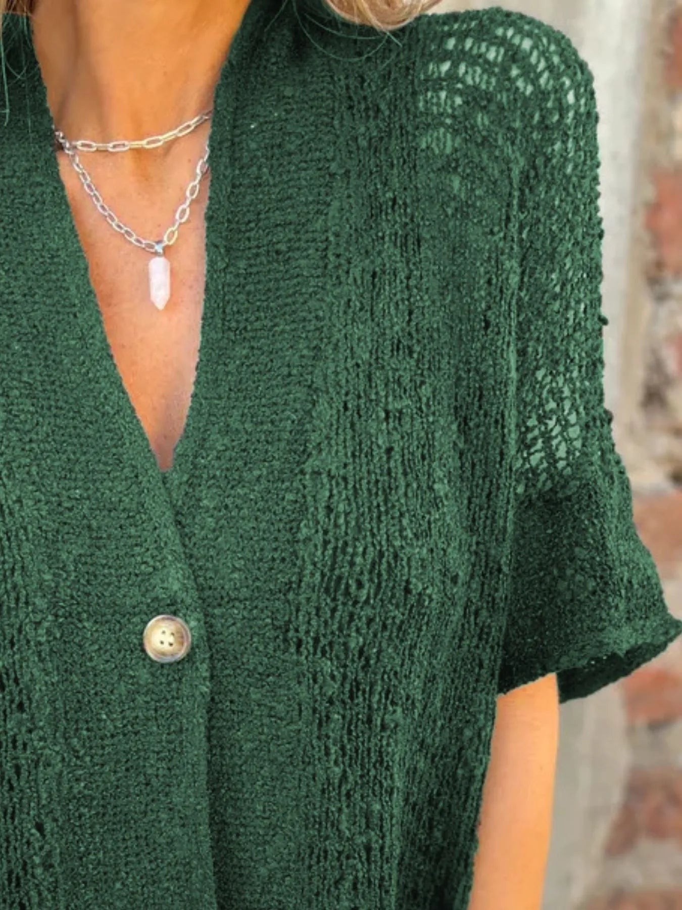 Plus size half-sleeve cardigan in green with one front button and V-neck, textured knit