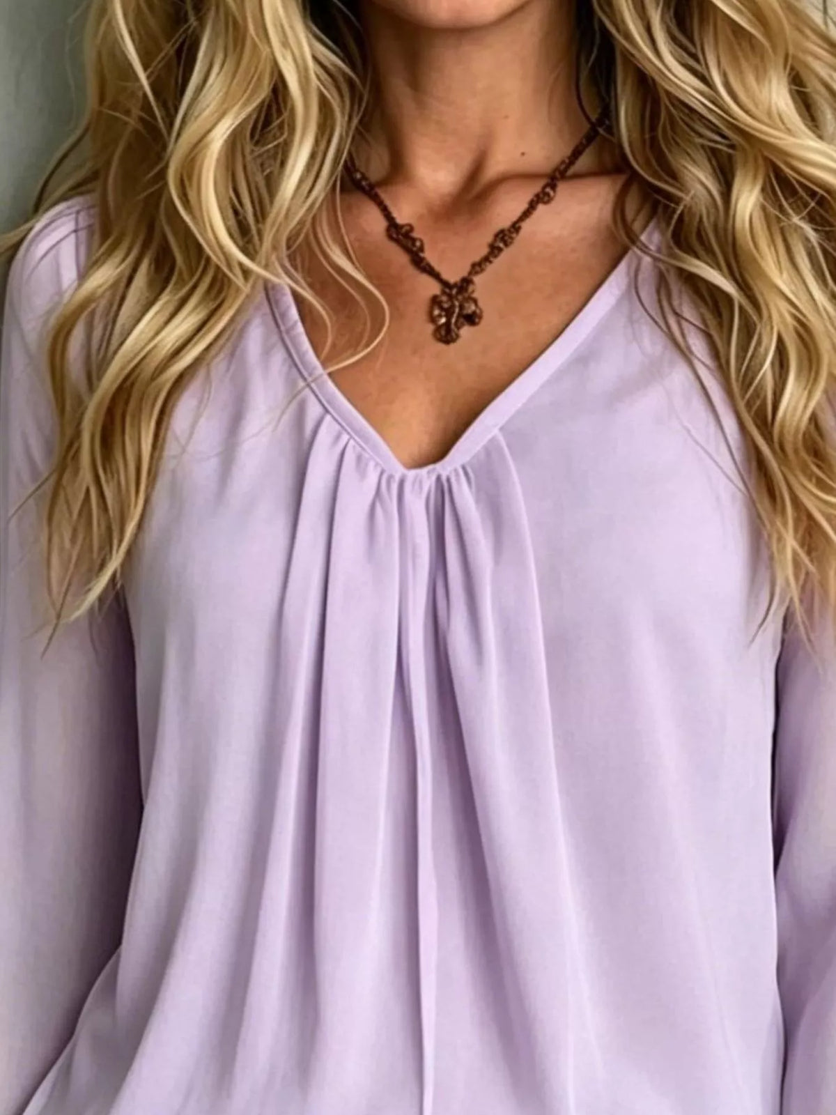 Pink purple v-neck polyester blouse with gathered neckline and softly pleated front