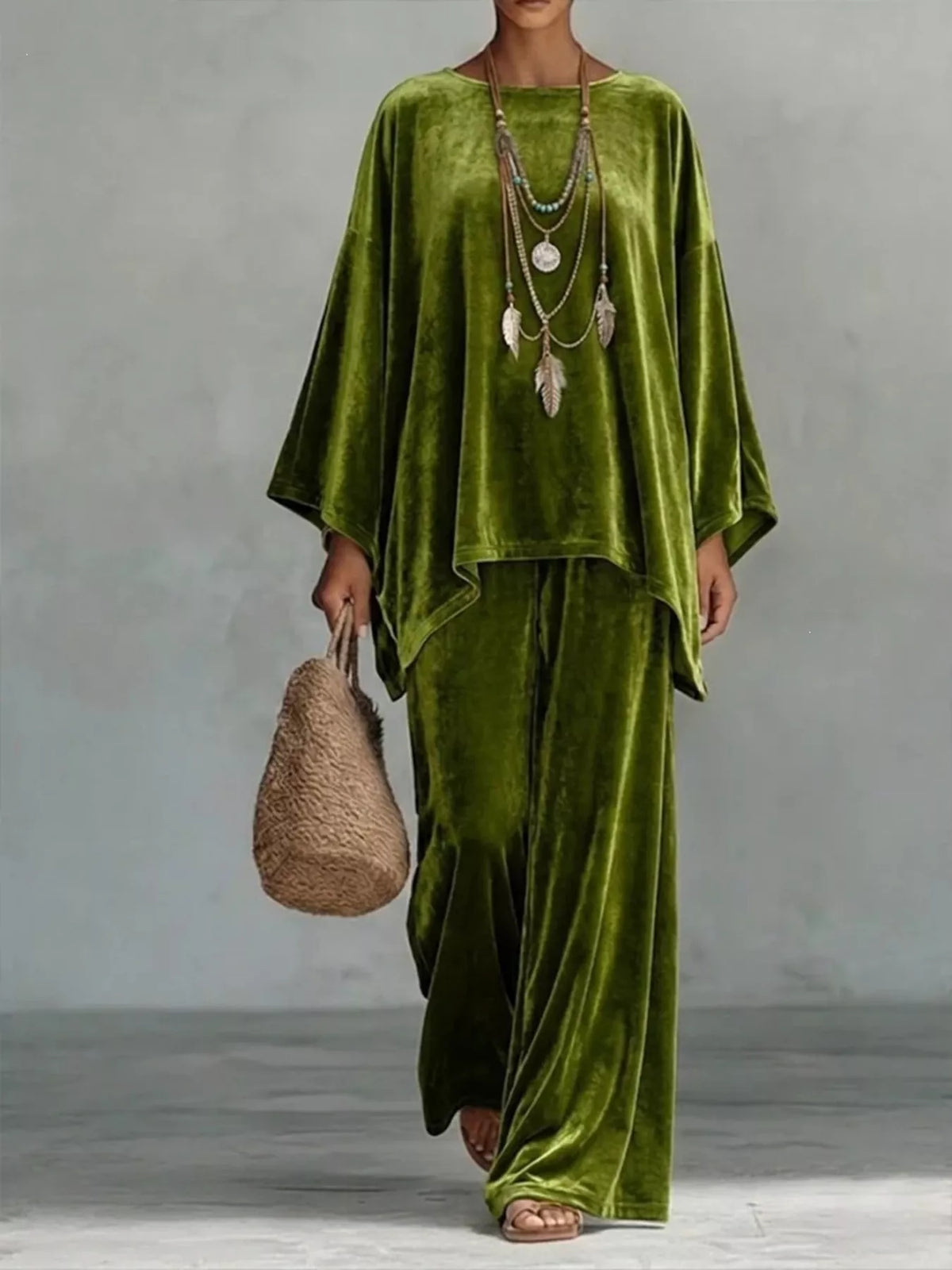Olive green velvet wide-leg pants set with loose asymmetrical poncho-style top