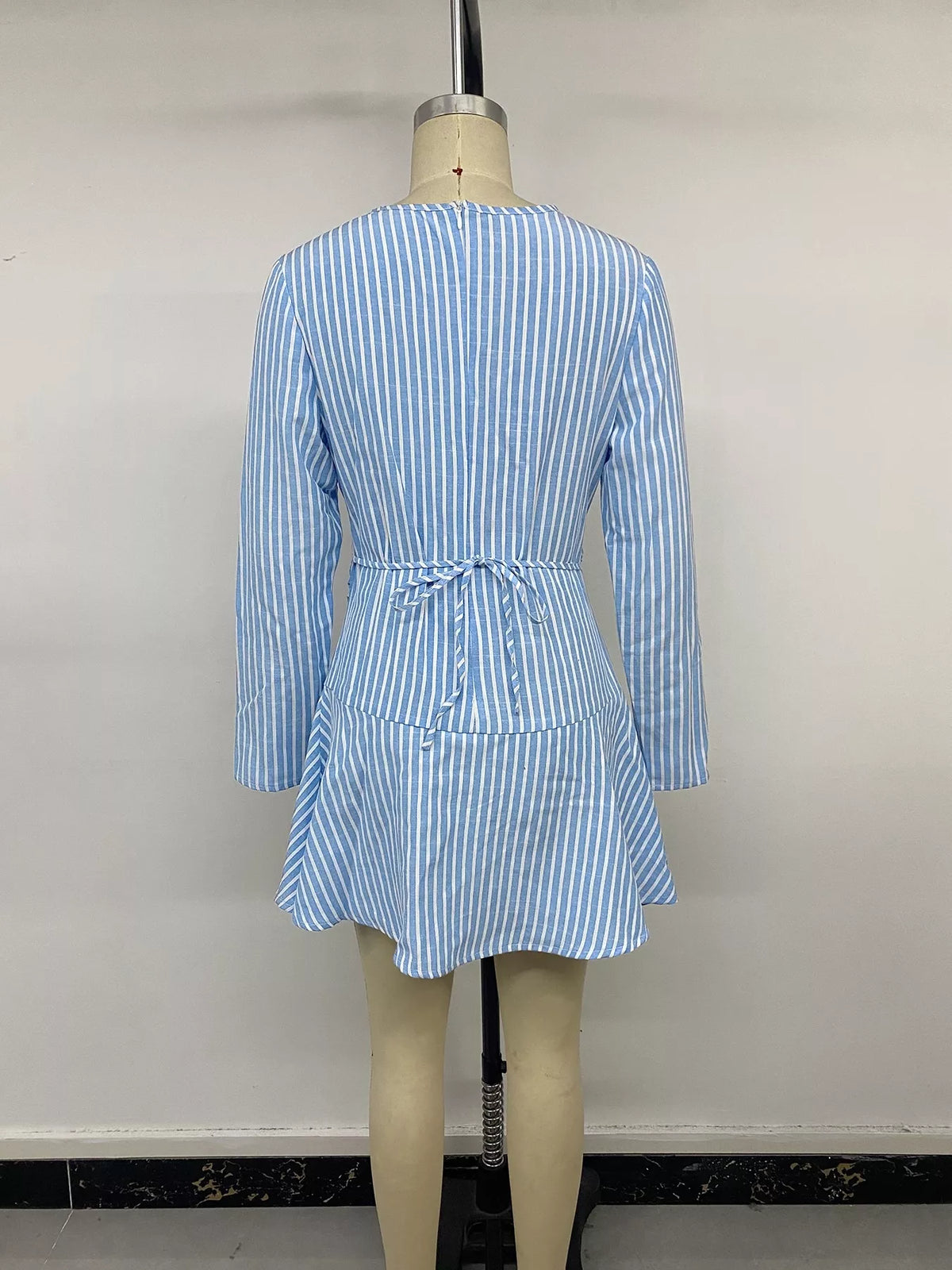 Blue striped long-sleeve mini dress with ruched back tie and gathered waist
