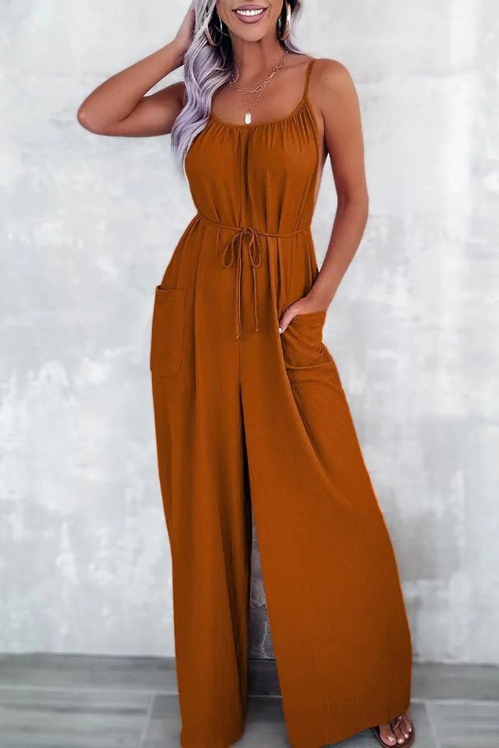 Terracotta spaghetti-strap wide-leg jumpsuit with drawstring waist and side pockets