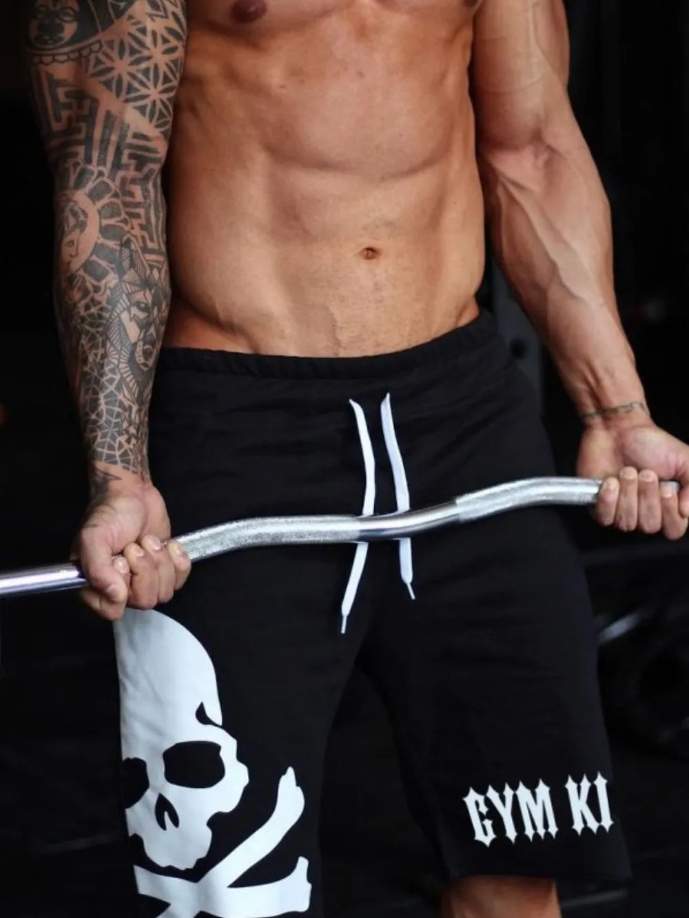 Men's skull drawstring shorts, black with white skull and GYM KIN print