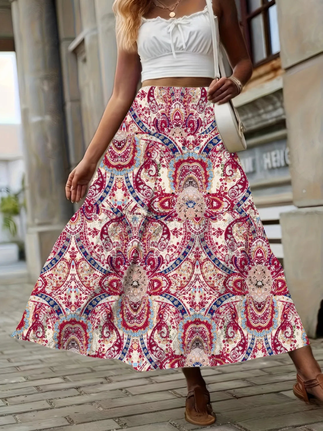 High-waist smocked printed skirt, red-and-cream paisley; tiered midi length