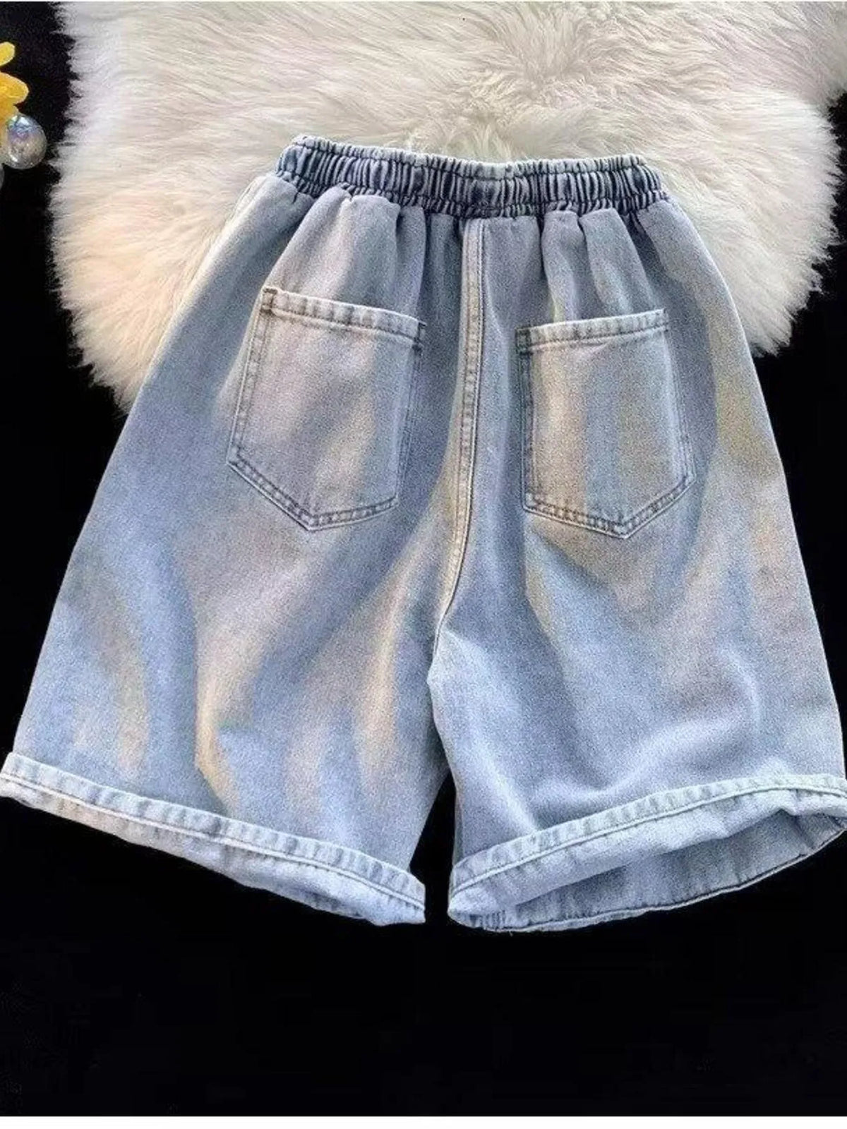 Men's elastic-waist washed denim shorts, light blue with front patch pockets