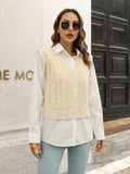 Ivory V-neck cable knit sweater vest, sleeveless with ribbed hem