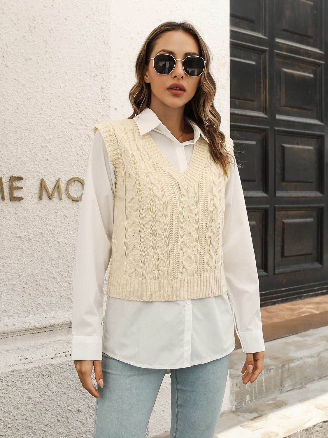 Ivory V-neck cable knit sweater vest, sleeveless with ribbed hem