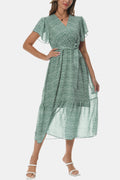Light green surplice V-neck dress with flutter sleeves, tie waist, tiered hem